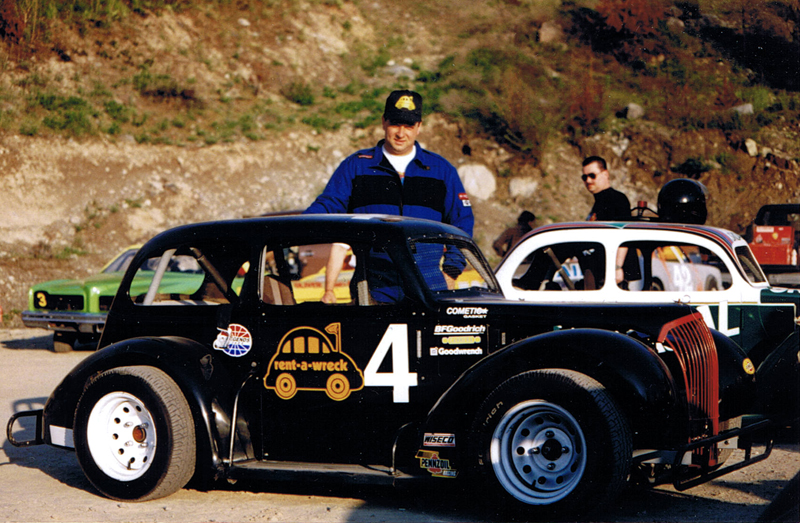 Darren Turner in the Penticton Speedway pits with the Rent a Wreck sponsored Legends race car Darren Turner in the Penticton Speedway pits with the Rent a Wreck sponsored Legends Series race car